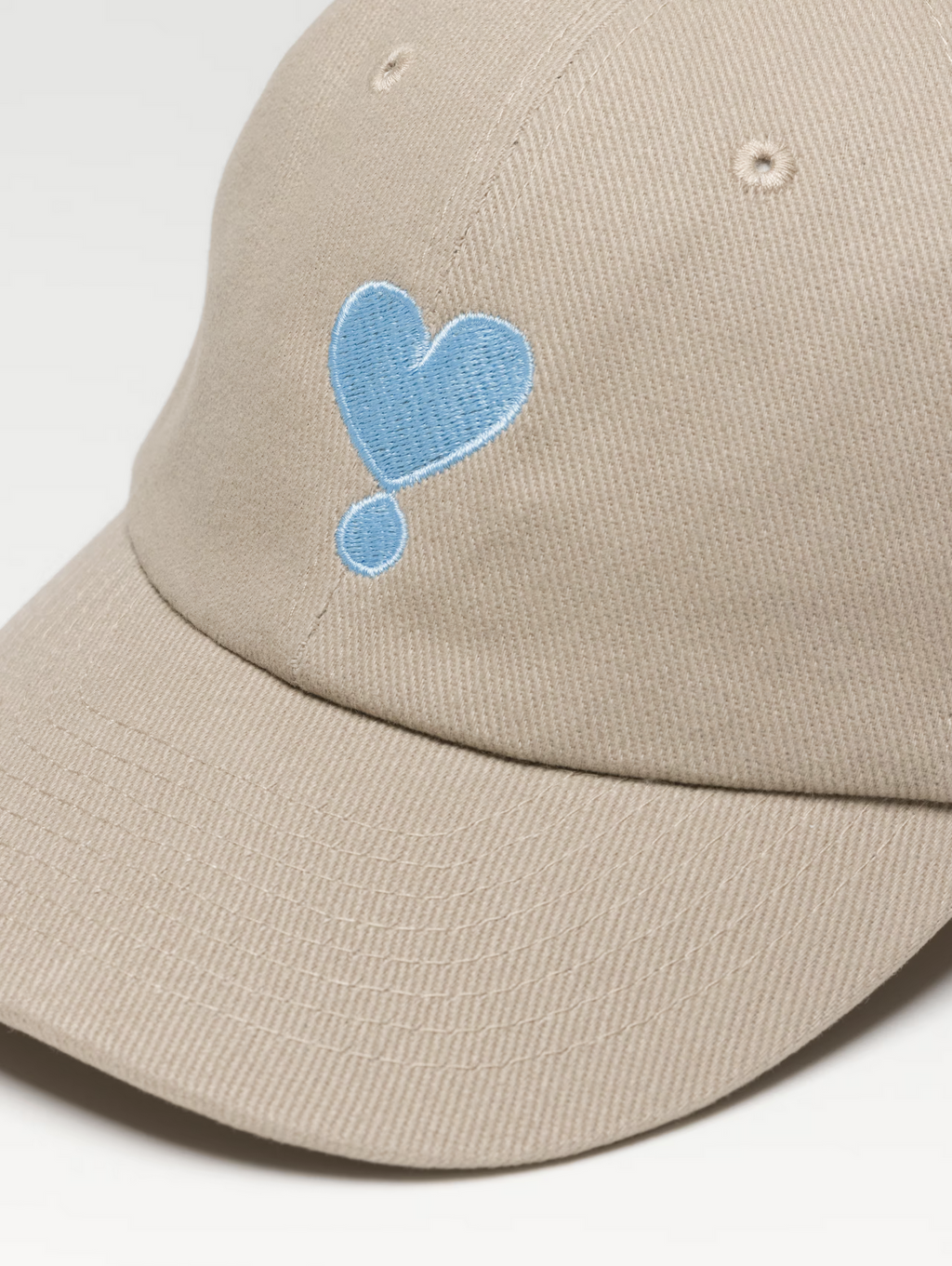 Tommy Cap Sourire Heart
